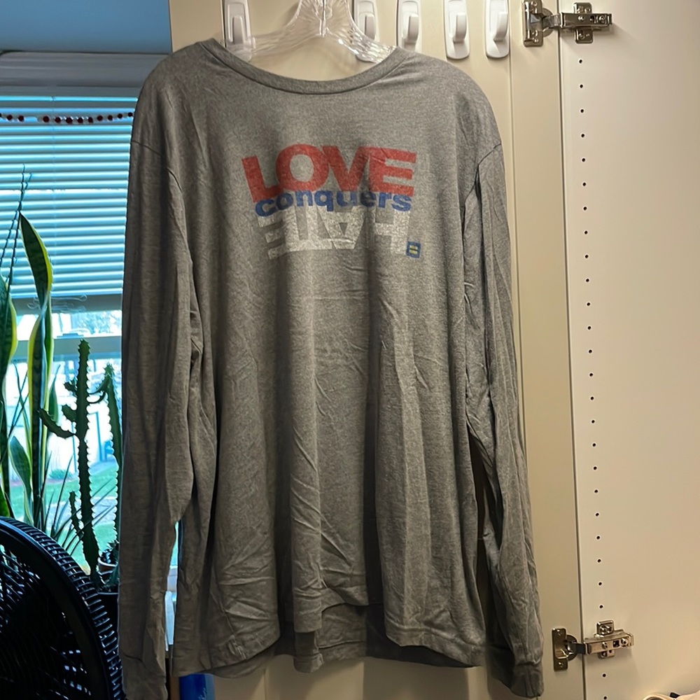 Love conquers hate long sleeve grey t-shirt